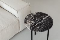 Kaboompics - Marble side table - round - greige linen sofa - cement floor