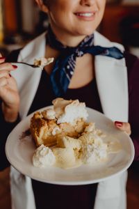 Apple pie with whipped cream and ice cream in Cafe Verte