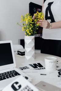 Workspace with yellow flowers