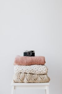 Kaboompics - Colourful sweaters & vintage camera
