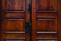 Photos from a walk around Zamość, Poland. Antique wooden doors.