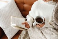 Kaboompics - A woman reads a book - a cup of tea