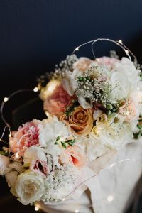 Kaboompics - Bouquet of flowers in a bag with some fairy lights