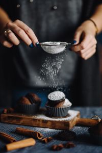 Kaboompics - Woman Sifting Powdered Sugar