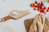 Kaboompics - Bread- tomatoes & cheese on cutting board