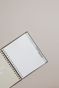 Kaboompics - Planner on beige background