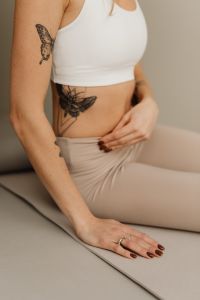 Kaboompics - Young woman practicing yoga at home
