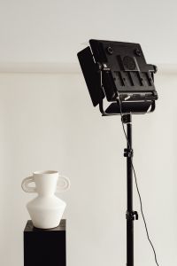 Photo studio interior - C-stand lighting tripod - photo backdrop - LED lamp