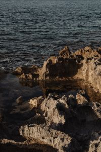 Kaboompics - Sea waves crashing on a rocky seashore - summer backgrounds and wallpapers
