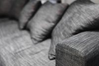 Kaboompics - Grey long sofa with pillows
