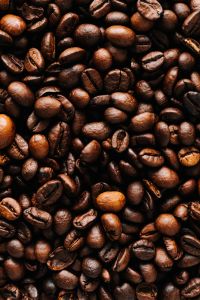 Dark roast coffee beans background