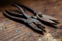 Rusty pliers in a workshop