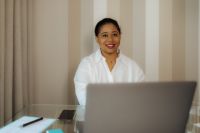 Kaboompics - Creative Black Woman Freelancer Working Remotely in a Modern Workspace