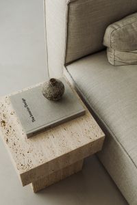 Travertine Coffee Table with Book and Vase- Minimalist Interior