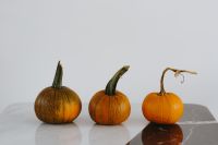 Kaboompics - Orange halloween pumpkins on marble