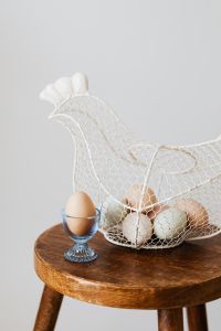 Kaboompics - Hen - shaped egg basket & glass egg holder