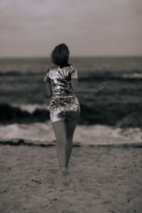 Kaboompics - Muted Tones & Golden Hour Hues - Women Celebrating by the Sea with Champagne