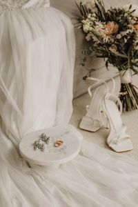 Kaboompics - Wedding dress - jewelry- shoes - bouquet