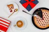 Kaboompics - Fresh baked blueberry pie, cup of coffee & Christmas gifts