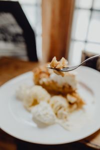 Kaboompics - Apple pie with whipped cream and ice cream in Cafe Verte
