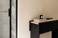 Kaboompics - Un'common Black Console With Travertine And Wood Veneer Decor