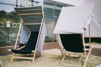 Beach chairs on sand