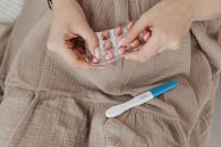 Kaboompics - Pregnant Woman Taking Vitamin Pills - positive pregnancy test