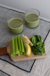 Green Smoothie Ingredients On A Linen Tablecloth