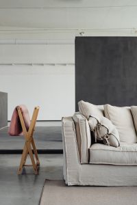 Kaboompics - Living room with comfortable linen sofa - carpet - pillows