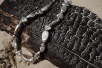 Beachside Beauty: Close-Up of Metal Necklace