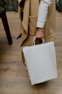 Kaboompics - Woman with blank paper bag