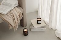 Kaboompics - Home decorations - beige armchair - candles - book - blanket