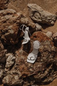 White high-heel thin-strap sandals - Buckle closure on the ankle strap