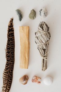 Kaboompics - Sage - Palo Santo Wood - feather - stones