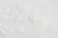 Kaboompics - Decorative snowflakes on fresh snow