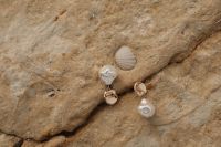 Kaboompics - Simplicity by the Sea - Minimalist Jewelry on Malta's Rocky Beach