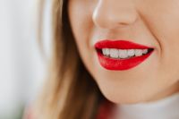 Kaboompics - Close-up on red female lips and white teeth