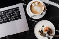 Kaboompics - Coffee and Cake with Laptop on Marble Table – Cozy Workspace Background