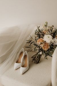 Wedding white heeled shoes - bouquet of flowers - veil
