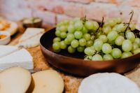 Cheese, white wine and grapes
