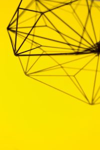 Geometric decoration on yellow background