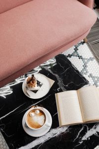 Kaboompics - Coffee Break in a Cafe with a Book and Dessert