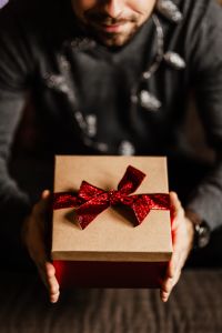 Kaboompics - A handsome man with Christmas presents