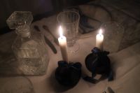 Kaboompics - Elegant Candlelit Table: Crystal Glassware - Satin Bows & Glowing Candles