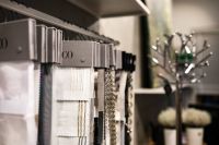 Kaboompics - Collection of design fabrics on hangers