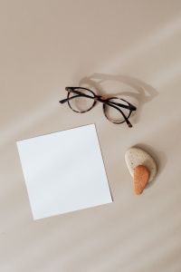 Kaboompics - Blank card & rock-glasses on beige background