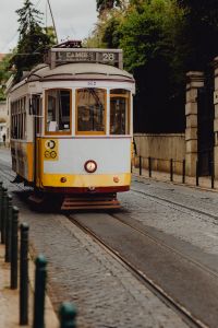 Famous vintage yellow 28 tram on street of Lisbon, Portugal