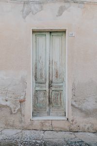 The old, scratched-up door