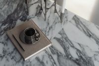 Kaboompics - Arabescato Marble Table - Metal Coffee Cup - Calendar - Candleholder