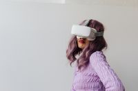 Young woman wearing neon clothes - VR goggles - virtual reality